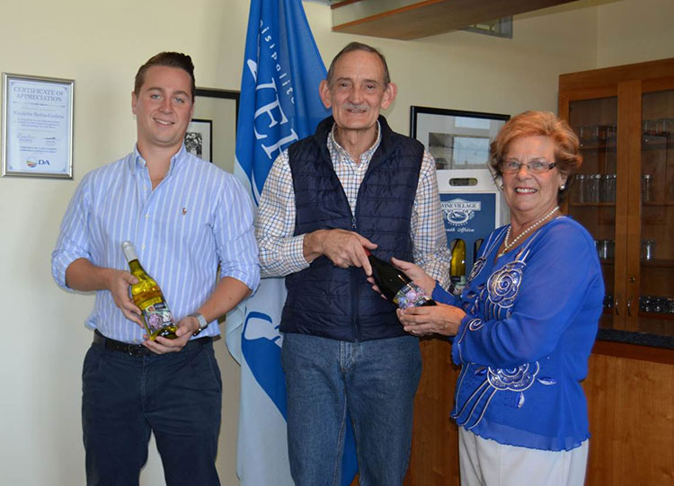Proudly displaying the limited edition FynArts Wine especially labelled to raise funds for the Hermanus FynArts Development Fund, are Overstrand Executive Mayor Nicolette Botha-Guthrie (right), along with Paul du Toit (centre) owner of Wine Village Hermanus and Adam Streeter (left) Operations Director of Benguela Cove.