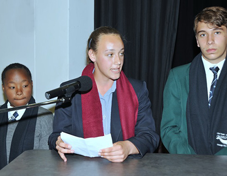 Flanked by her two deputies, Phumeza Doda and Timo-Ben Lerm, newly inaugurated junior mayor Kaci van Romburgh delivers the first of many an impassioned plea on behalf of Overstrand’s youth.