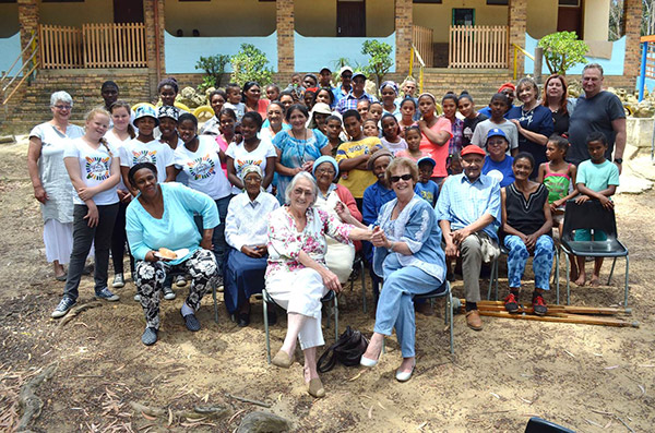 Photo caption: Pictured centre are local benefactor, Mrs von Maltzahn and Executive Mayor, Nicolette Botha-Guthrie flanked by members of the Handevat Marimba Band (far left, second and third rows), Ward Councillor Lianda Beyers-Cronje (far right, fifth row), Camphill Farm Community members and residents and children of Karwyderskraal for whom the Annual Children's Christmas was thrown.